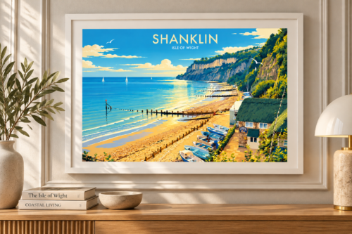 Shanklin Isle of Wight A3 art print displayed in a lifestyle setting above a wooden sideboard.